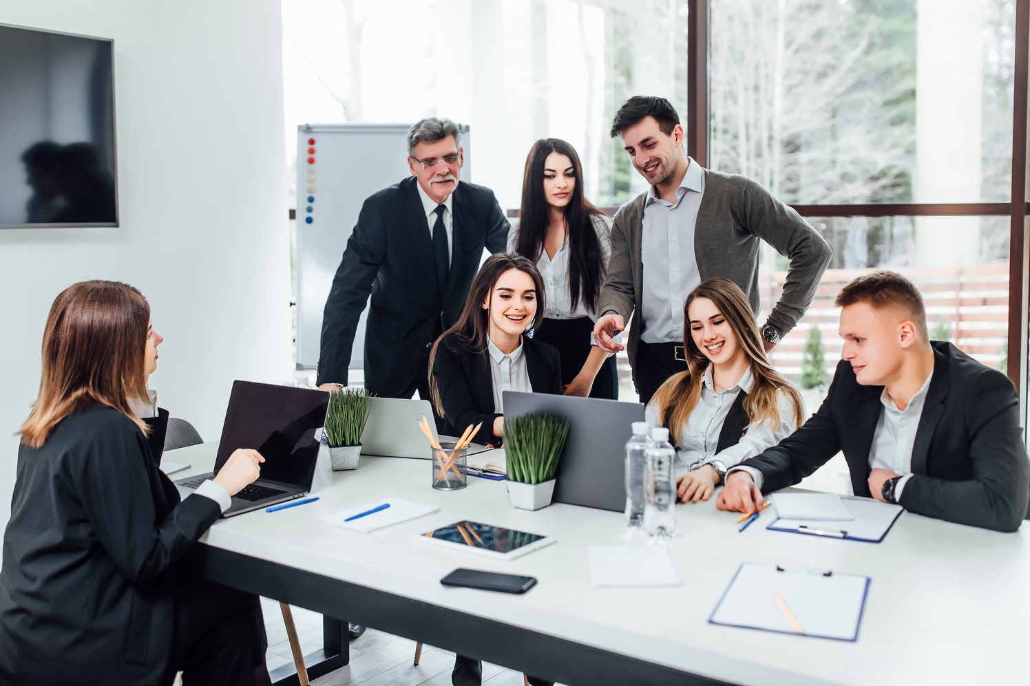 staff-meeting-group-young-modern-people-smart-casual-wear-discussing-something-while-working-creative-office-business-time-1.jpg